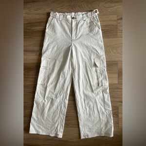 white cargo pants with brown sewing lines